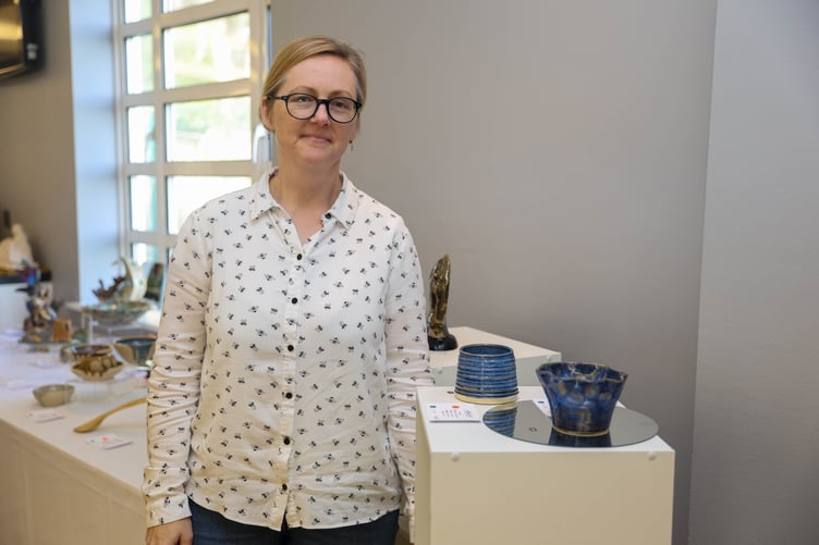 Linda Quirk with her ceramic work