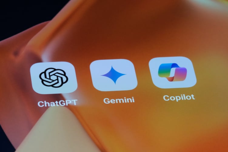 Google Gemini, OpenAI ChatGPT and Microsoft Copilot app icons on screen. Assorted AI mobile apps