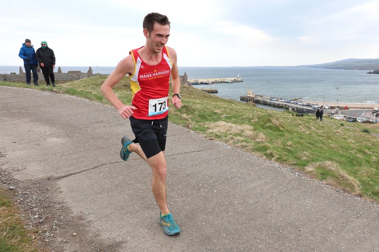 Manx Harriers' Chris Killey was the leading local man overall at the Easter Festival of Running in 38th place. He's pictured in action during Saturday's Peel Hill Race sponsored by Full Factory Winnerswear (Photo: Dave Kneen Photography)