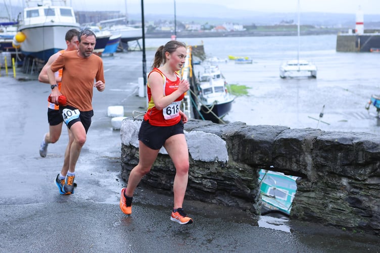Manx Harriers' Laura Dickinson - pictured here in the IQEQ Port Erin 10k road race - was the leading local overall when finishing 28th in the women's class (Photo: Dave Kneen Photography)