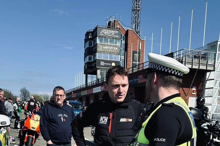 Manx TT Rider and H&H Motorcycle co-founder Nathan Harrison chats to a Police officer after the inaugural H&H Easter Bunny Ride Out in aid of Hospice Isle of Man.