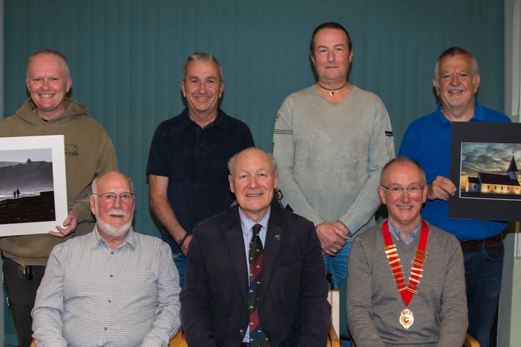 Back row (left to right): competition winners Sean Corlett; Barry Murphy, Nigel Owen and Martin Sanderson. 
Front row, left to right: Judge Dennis Wood, Patron His Excellency the Lieutenant Governor Sir John Lorimer and IOMPS president Andrew Cairns