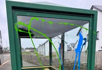 Bus shelter vandalised with paint at Janet's Corner in Castletown