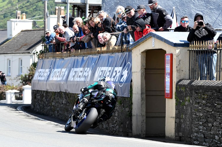 Spectators watch the Supersport race 2 in Ballaugh at Isle of Man TT 2024