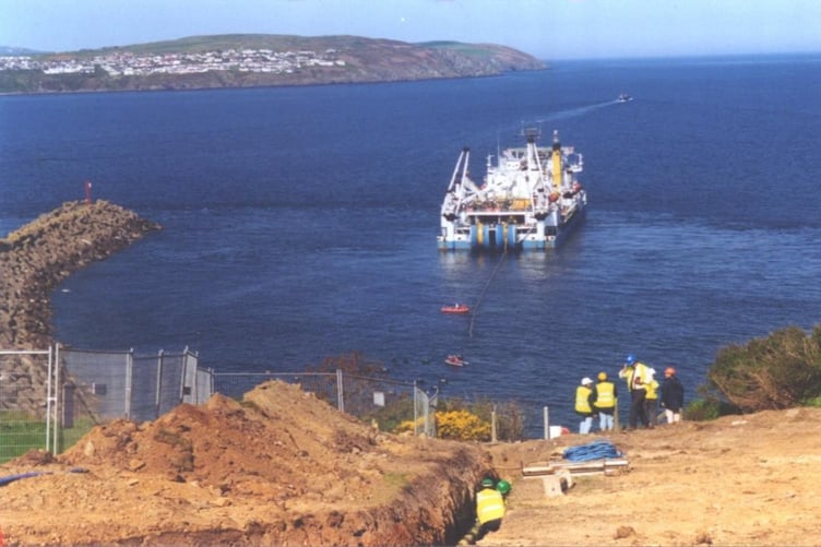 The subsea interconnector and supporting communications fibre optic cable were brought ashore at Port Skillion in the year 2000