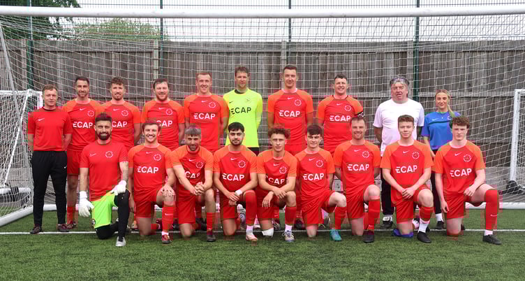 The Isle of Man FA men's national side that defeated Halewood Apollo FC 4-3 at the weekend in what  was Chris Bass Jr's (far left) first match in charge (Photo: Paul Hatton)