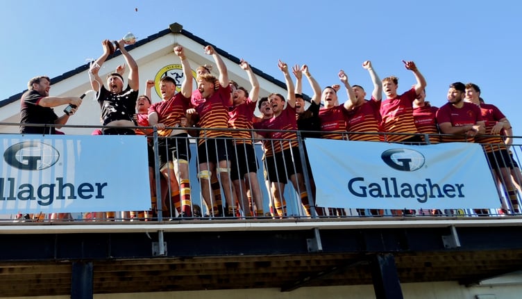 The Champagne starts to flow as Douglas Rugby Club players celebrate successfully retaining the Manx.Cup by beating Vagabonds in Saturday's final at Ballafletcher (Photo: Tony Wilson-Spratt)