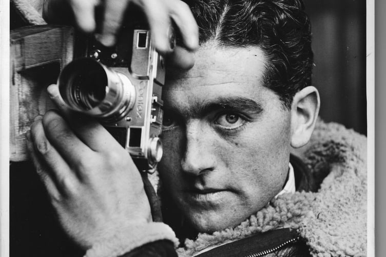 Leonard McCombe with his Contax camera during World War Two