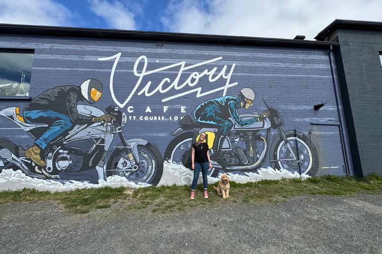 Vicky outside the Victory Cafe as preparations continue for Isle of Man TT 2025
