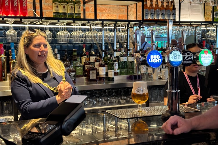 'I'll have to charge you for a half pint!' joked Mayor Natalie Byron-Teare after pulling the first pint in The Conister Arms shortly after 8am this morning 