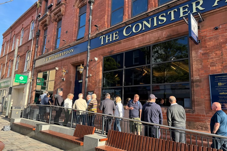 Crowds were waiting as early as 7.30am this morning for the opening of The Conister Arms, the island's first Wetherspoon pub