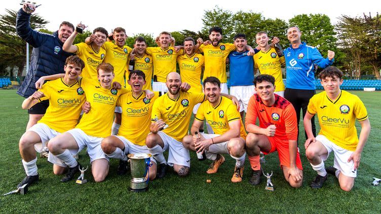 Braddan AFC celebrate winning the Paul Henry Gold Cup after beating Old Boys 4-1 in Wednesday evening's final at the Bowl (Photo: Gary Weightman)