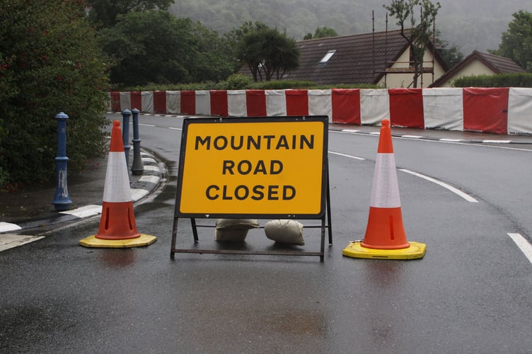 The A18 Mountain Road is closed following a crash