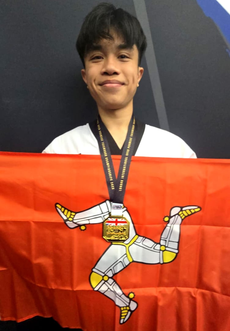 Nino Ontoy flies the Manx flag with his gold medal at the 2025 London International Open Poomsae Championships