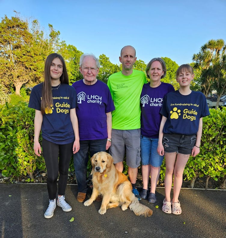 Left to right: Katie Jacobs, Philip Frear, Daniel Jacobs, Rebecca Jacobs, Emily Jacobs and Golden Retriever, Dexter