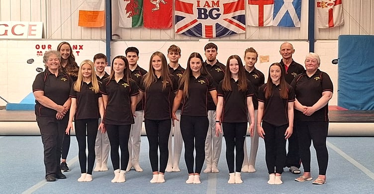 The 12-strong Isle of Man gymnastics team which will compete in this summer's Island Games in Orkney, alongside team manager Helen Duggan plus coaches Amanda Keating, Gennady Tsyganov and Stacey Saltwell