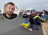 Moving moment crowds drop to their knees in tribute to war hero
