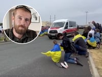 Moving moment crowds drop to their knees in tribute to war hero