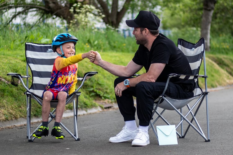 Sir Mark Cavendish being interviewed by a junior rider (Photo: Gary Jones/Manxman Photos)
