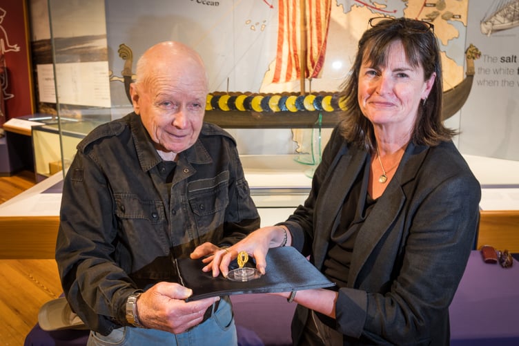 Finder Ronald Clucas with Manx National Heritage curator Allison Fox