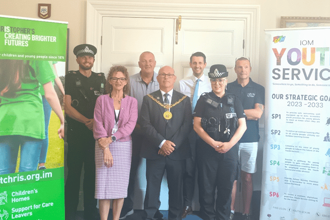 Left to right: PC David Talbot; Julie Gibney, assistant director of Children and Families Social Work, Manx Care; Steve Taylor, head of Children’s Residential Services at St Christopher’s; Steven Crellin, Mayor of Douglas; Oliver Cheshire, City Centre Manager; PC Naomi Faragher; and Nigel Howard, principal youth worker