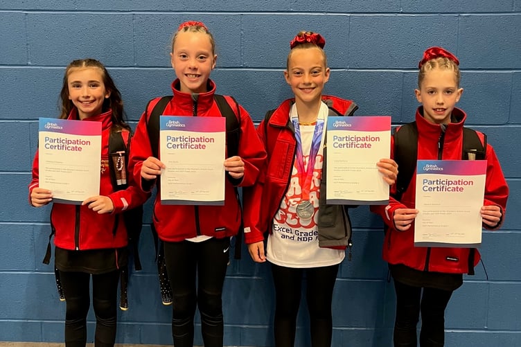 The Ellan Vannin Gymnastics Club quartet of Jessica Shannon, Ava Quirk, Chelsea D'Ottavio and Lora Markova with their performance certificates after impressing at the British Gymnastics National Finals in Stoke-on-Trent