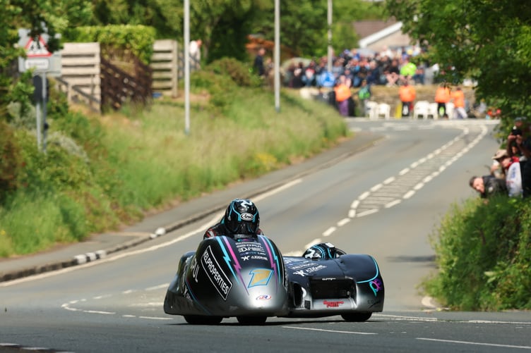 Ryan and Callum Crowe on their way to a third TT victory