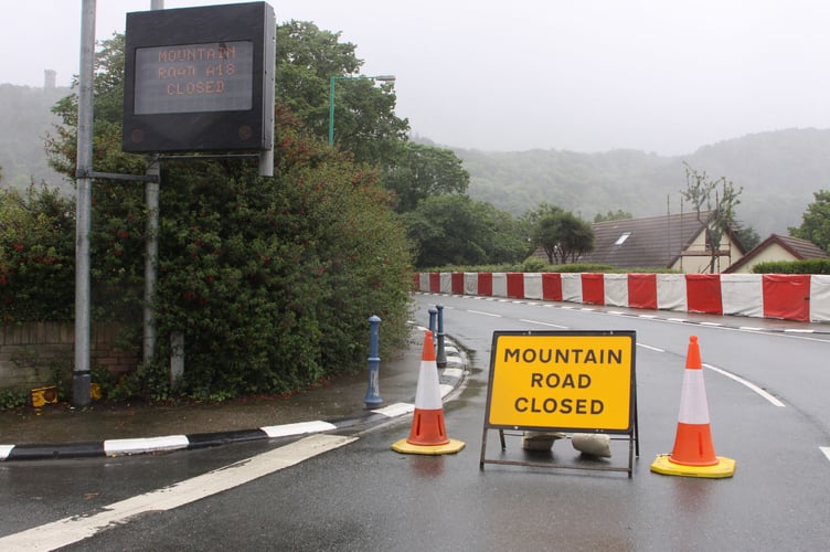 Mountain Road closed because of a crash