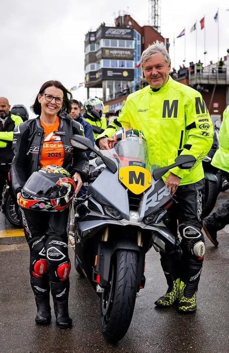 Political member for motorsport Sarah Maltby with travelling marshal Jim Hunter ahead of the Legacy Lap 