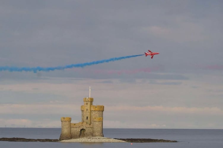 A Red Arrow aircraft flying near the Tower of Refuge during the display (Charlotte Moran)