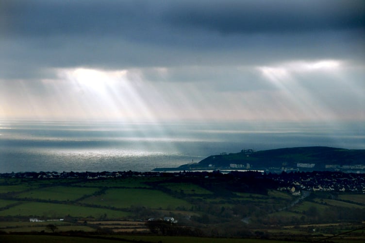 Dark clouds over Douglas Bay