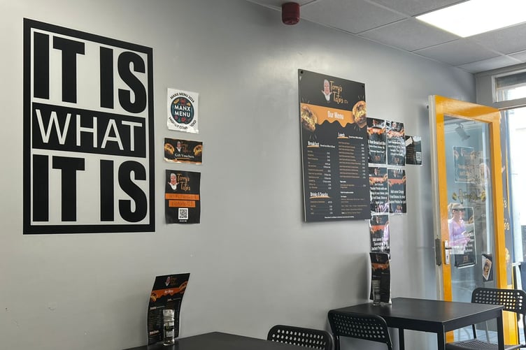 The 'It is what it is' sign inside Terry's Tatos