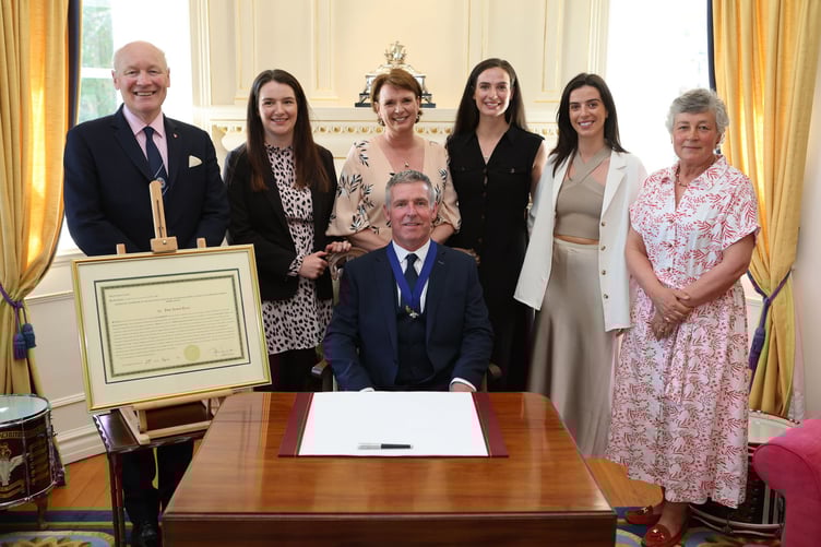 Mr Teare and his family with the Lieutenant Governor Sir John Lorimer and Lady Lorimer