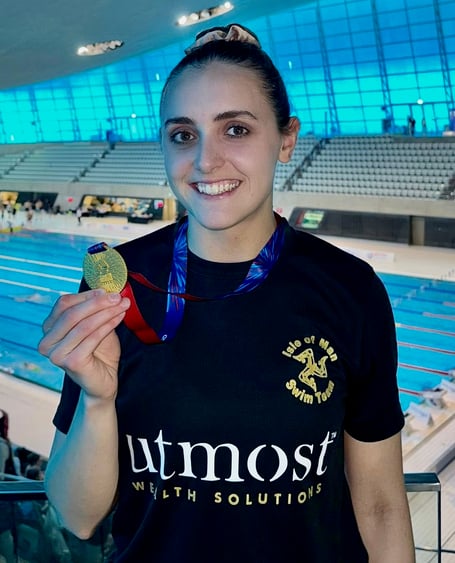 Laura Kinley with her 50m breaststroke gold medal from the opening day of the British Masters Championships in London
