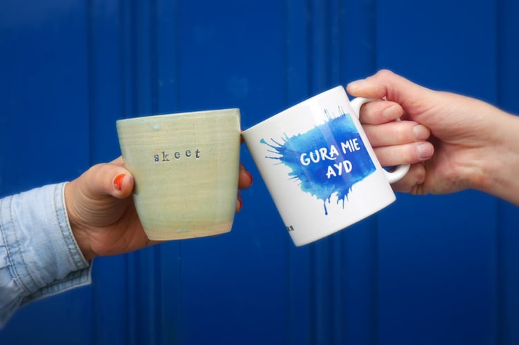 Manx mugs designed by Aossi (left) and Felicity Wood Designs