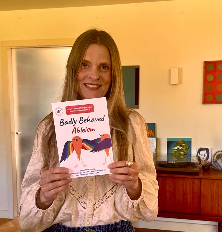 Without Wings' Founder and Cahir Jackie Morrey-Grace with the book 'Badly Behaved Ableism'