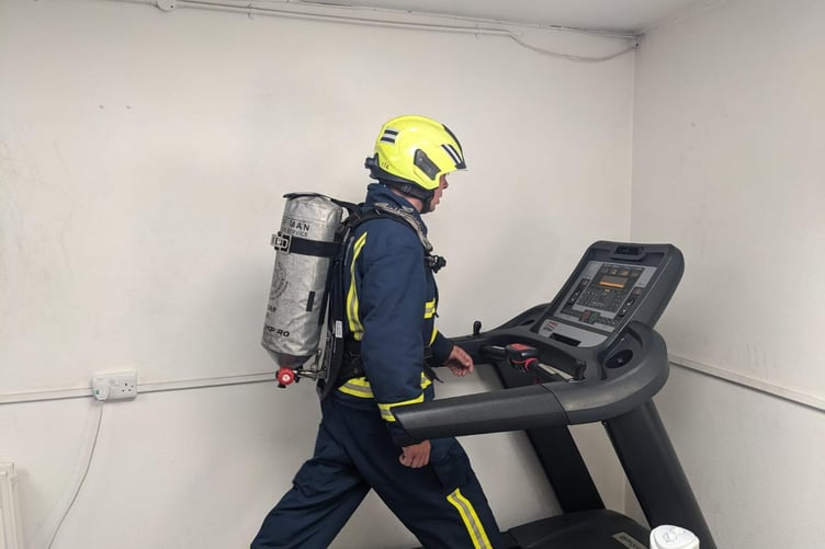 Isle of Man Fire and Rescue Service Sub Officer Nick Hays in training to complete the Parish Walk in full kit