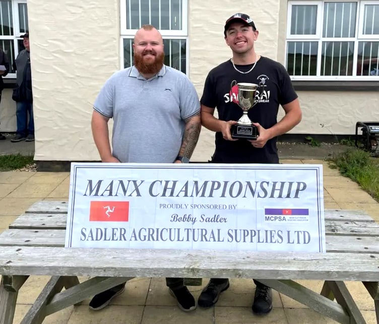 Newly-crowned Sportrap Manx Champion Liam Kirkpatrick with the trophy alongside runner-up Jack Kneen