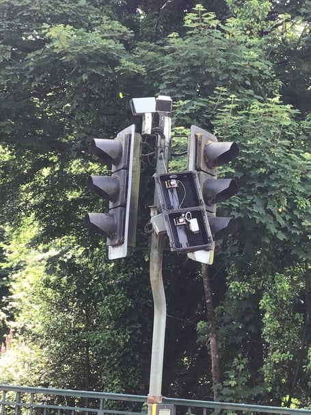 The damaged pedestrian light head on the crossing which is located on Laxey Bridge near the Glen Gardens