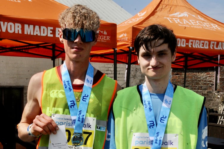 Robert Farnworth (right) won the Under-21 Parish Walk to Peel ahead of Connor Cain (Photo: John Watterson)