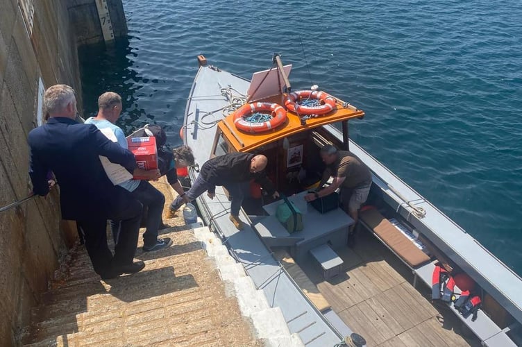 His Excellency Sir John Lorimer and Lady Lorimer preparing to set sail to the Calf of Man