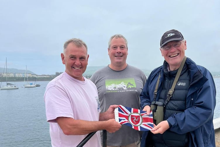 His Excellency presented Manx sailor Steve Clague with a Lieutenant Governor’s flag for his boat, which runs trips to the Calf.