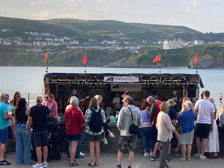 Crowds flock to the 'Bay wall' opposite the Bay Hotel