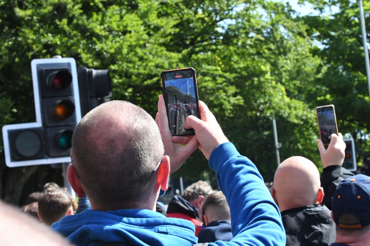 TT spectators taking some shots of the racing