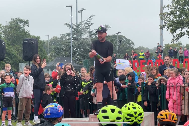 The Manx Missile sprayed champagne off the new 'Sir Mark Cavendish Raceway Podium'