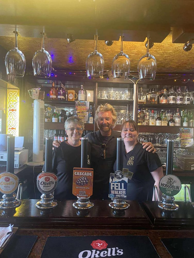 Noel Edmonds with staff at the Creek