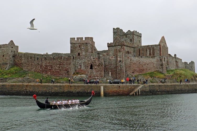 Despite the drizzle, it was high spirits for the 400m sprint race around Peel harbour