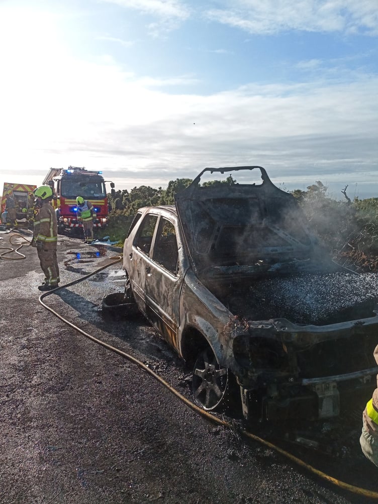 The aftermath of the car fire in the area of Little London in Kirk Michael