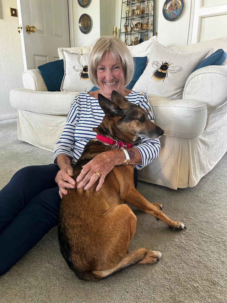 Janet is 'delighted' to be reunited with Elvis the dog