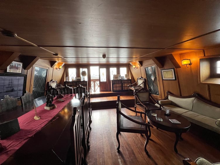 A dining room at the rear of the ship in the middle deck